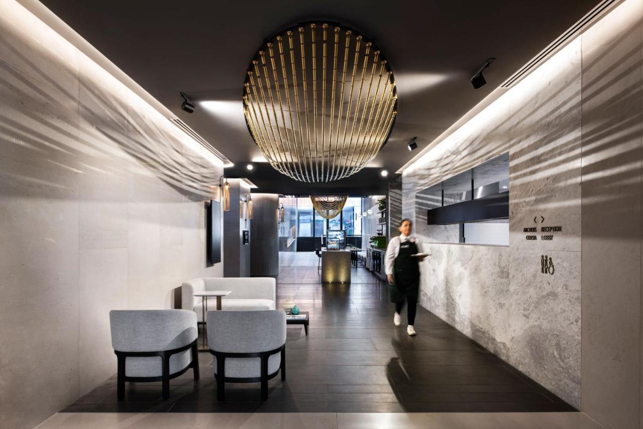 Melbourne Marriott Hotel Docklands Bagian luar foto The interior of the lounge